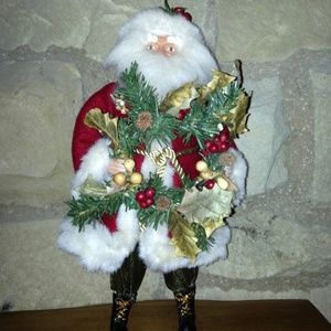 Vintage Santa Figure holding wreath holly